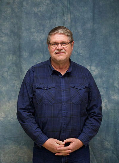 Bruce Carlson, Director 