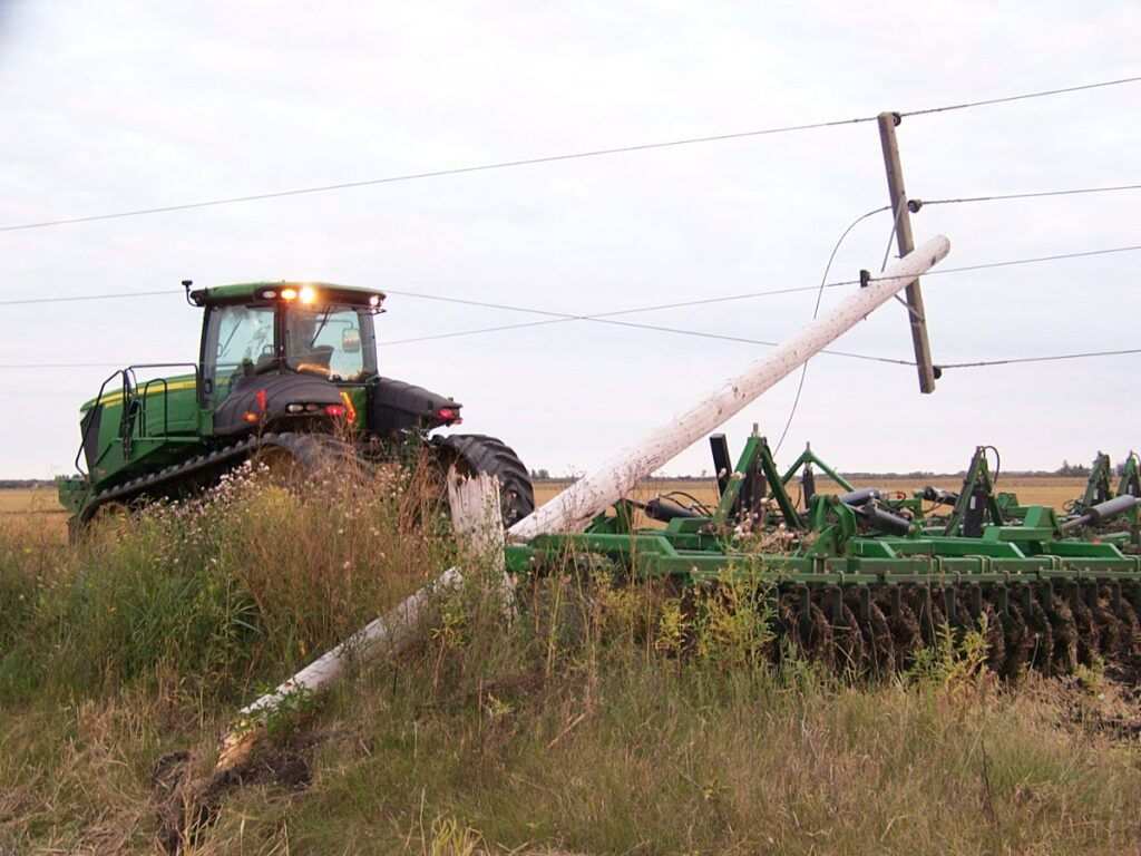 powerline downed by farm tractor seeder